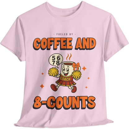 Pink cheerleading t-shirt with a cartoon cheerleader coffee cup character and text on a white background